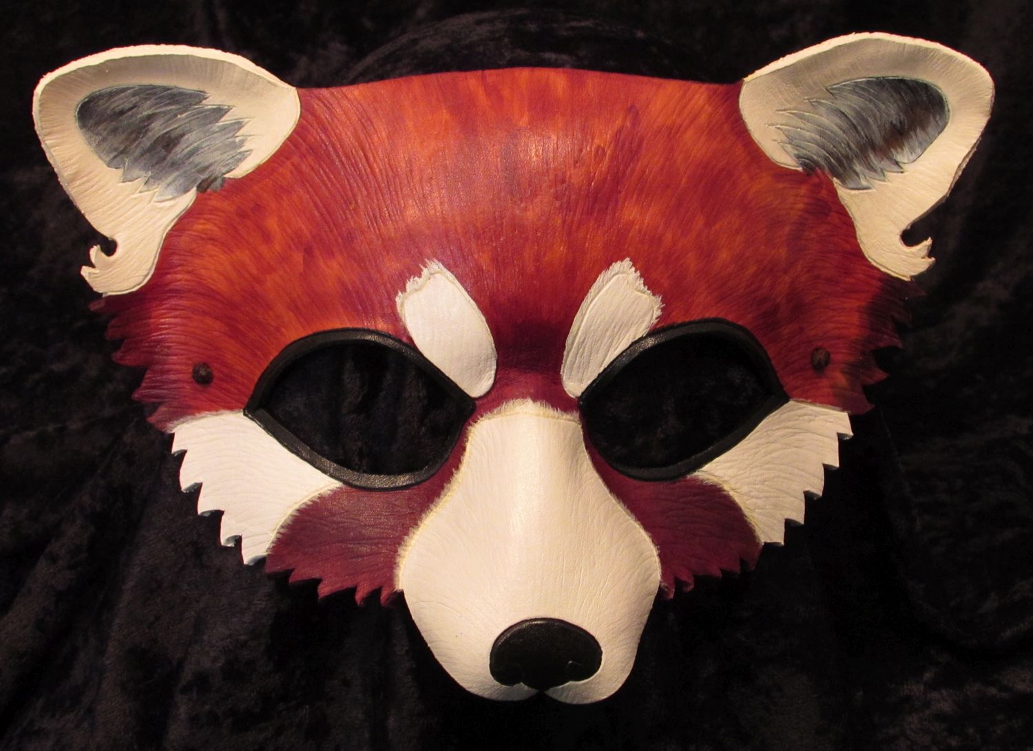 Red panda mask.