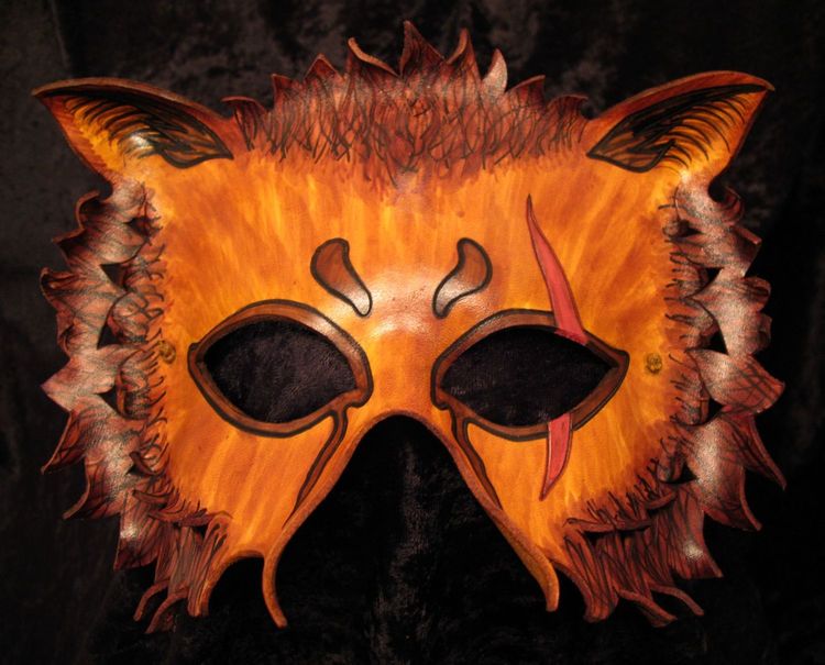 Scarred lion mask.